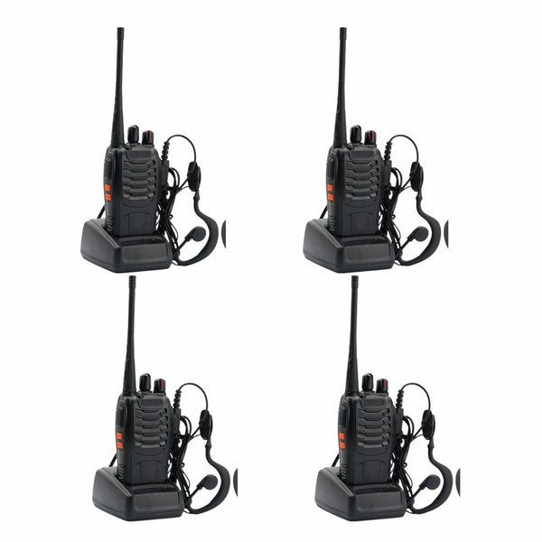Four black walkie-talkies with earpieces on a white background