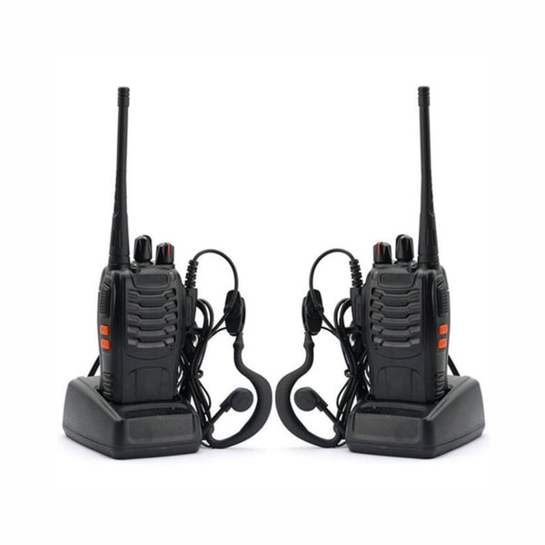 Two black walkie-talkies with headsets on a white background
